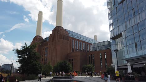 Battersea-Power-Station-in-London,-England-is-a-regenerated-former-derelict-building-which-generated-electricity-via-burning-coal