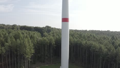 A-pull-away-drone-shot-of-a-wind-turbine-in-Germany