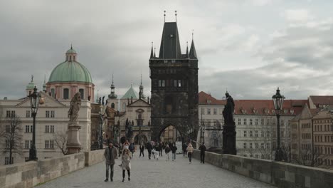 Iconic-Charles-Bridge-tower-and-surrounding-architecture-in-Prague,-Czech-Republic