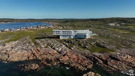 Fogo-Island-Inn-Hotel-with-it's-Modern-Unique-Architecture-Isolated-on-a-Hilltop-of-Rocky-Coastline-near-the-Town-of-Tilting,-Canada