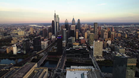 Aerial-view-away-from-the-downtown-of-Philadelphia,-fall-evening-in-USA