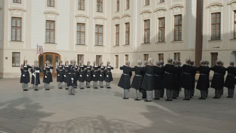 Guards-in-formation-at-Prague-Castle-courtyard,-Czech-Republic,-change-of-the-guards