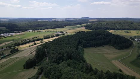 A-drone-shot-of-the-beautiful-landscape-of-Boos-in-the-Eifel,-Germany