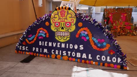 Skull-sign-welcomes-people-to-primary-school-on-Day-of-the-Dead,-MX