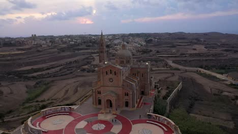 Aerial-drone-video-footage-church-at-Gozo,-Malta-with-environment