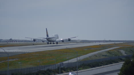 Giant-double-decker-Lufthansa-Airlines-aircraft-landing-at-Los-Angeles-International-Airport