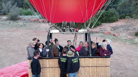 Flight-Crew-Explaining-Instructions-On-People-Before-Launching-The-Hot-Air-Balloon-In-Sedona,-Arizona