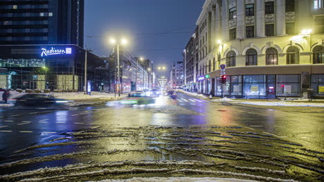 Radisson-hotel-and-busy-downtown-Riga-street-in-winter-season,-time-lapse