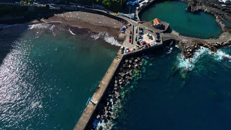 Drone-bird's-eye-view-of-Seixal-natural-volcanic-basalt-pools-in-Madeira-Portugal