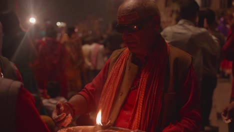 Elderly-male-worshipper-attending-Indian-Festival-of-light