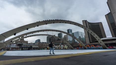Ice-Skating-At-Nathan-Phillips-Square-In-Toronto,-Time-Lapse