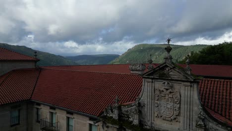 Aerial-Footage-Of-Santo-Estevo-Monastery,-Its-Buildings-And-The-Sil-Canyon