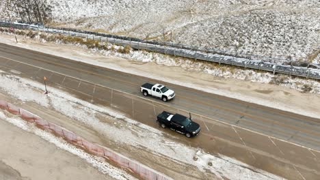 Aerial-tracking-of-traffic-along-a-coastal-road-in-Winter
