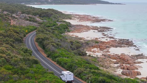 Motorhome-van-driving-along-coastal-road-in-Dunsborough,-Western-Australia