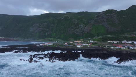 Wide-shot-of-Fajã-Grande-flores-island-during-cloudy-day---Drone-shot