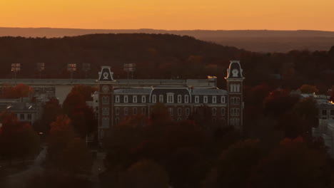 Facade-Of-Old-Main-Building-In-The-University-Of-Arkansas-Campus-At-Dusk
