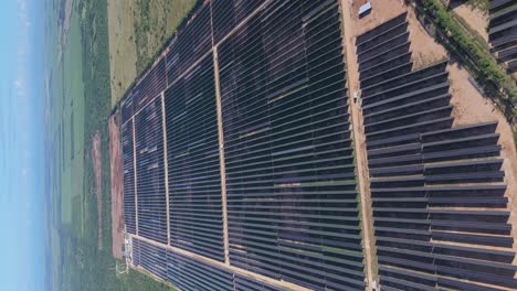 Panoramic-View-Of-Photovoltaic-Solar-Panels,-Dominican-Republic---Vertical-Shot