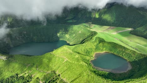 Cinematic-drone-shot-from-clouds-of-Rasa-and-Santiago-Lagoons-at-Sete-Cidades