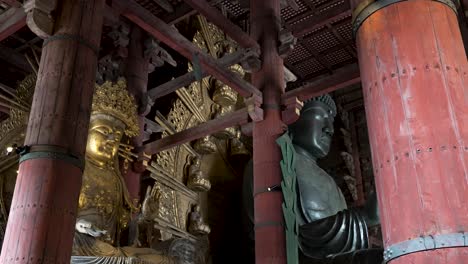 The-Great-Buddha-Daibutsu-in-main-hall-with-gold-Kokūzō-Bosatsu-statue,-Nara-Japan
