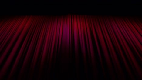Looking-up-from-stage-height-at-deep-red,-heavy-theatre-curtains-or-main-drape-when-closed