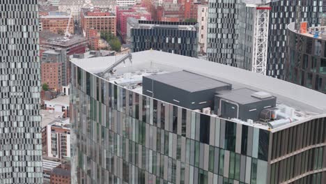 Top-aerial-view-of-Deansgate-Square-luxury-residential-towers-in-Manchester,-UK