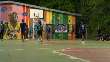 Black-african-athletes-play-basketball-at-night