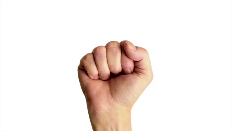 Close-up-shot-of-a-male-hand-holding-up-a-classic-power-or-fist-sign,-against-a-plain-white-background