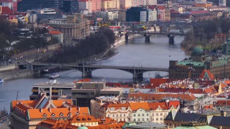 Traffic-on-the-Bridges-over-the-Vltava-river-in-Prague,-Czech-Republic