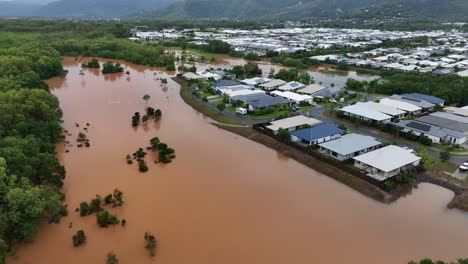 Flooding-from-Cattana-Wetlands-close-to-houses-caused-by-Cyclone-Jasper-in-Trinity-Park,-Cairns