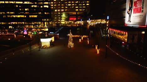 Beautiful-aerial-of-Christmas-tree-in-Utrecht-city-center-in-the-Netherlands-at-night