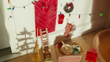 Scandinavian-elf-door-with-shadow-play-and-festive-adornments
