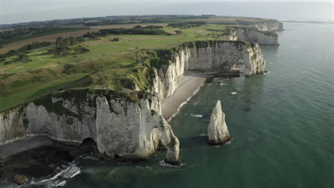 Aerial-view-of-the-Etretat-chalk-cliffs-during-a-sunny-day,-Etretat,-Normandy,-France