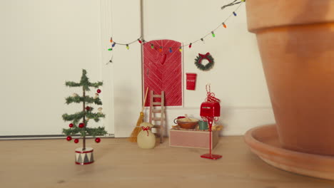 Scandinavian-Nisse-door-scene-with-Christmas-decor,-a-Nordic-tradition