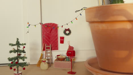 Scandinavian-Nisse-door-scene-with-Christmas-decor,-a-Nordic-tradition
