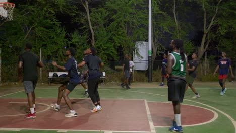 Slow-motion-of-successful-basketball-team-attack-scheme-three-point-score-black-athletes-team