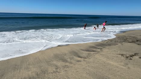 HD-Footage-of-people-playing-at-the-beach-on-a-beautiful-sunny-day