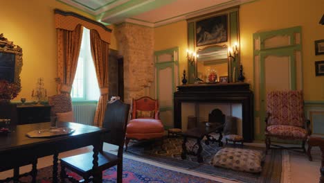Indoor-dining-room,-relax-area-with-a-fireplace,-vintage-decoration-in-french-castle