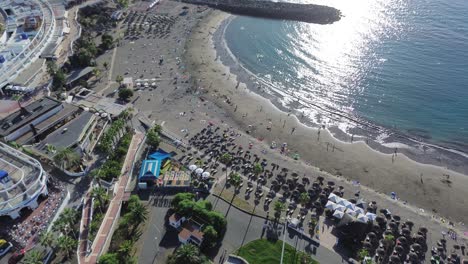 Aerial-beach-in-Tenerife,-holiday-destination-in-Canary-Islands-Spain