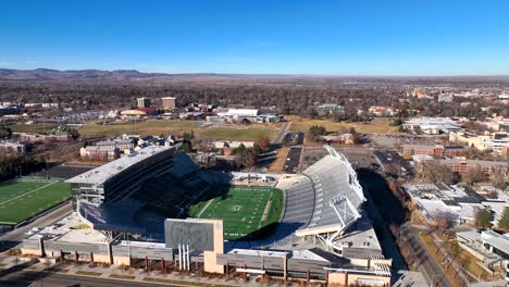Drone-flight-towards-empty-collage-football-stadium-in-Fort-Collins-Colorado-USA