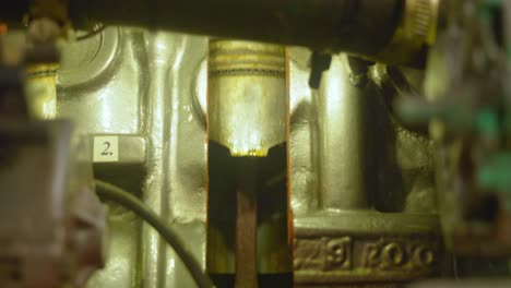 Closeup-of-piston-moving-inside-a-car-engine,-Car-engine-parts