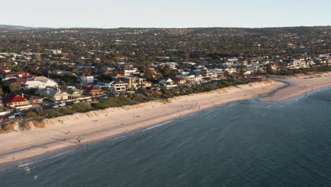 Aerial-shot-of-Brighton-suburb-houses-and-beach,-Adelaide,-South-Australia