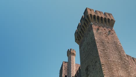Slow-establishing-shot-of-the-beautiful-towers-at-Chateau-de-Pouzilhac