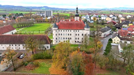 Aerial-View-Over-Schloss-Hartheim-Castle-In-Alkoven,-Upper-Austria---Drone-Shot
