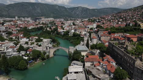 Drone-view-of-Mostar-Bridge-in-the-Balkans,-an-example-of-ottoman-architecture