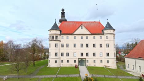 Drone-Shot-Of-Hartheim-Castle-In-Alkoven,-Upper-Austria