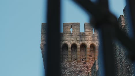 Slow-motion-dolly-shot-showing-a-castle-tower-at-Chateau-de-Pouzilhac-in-France