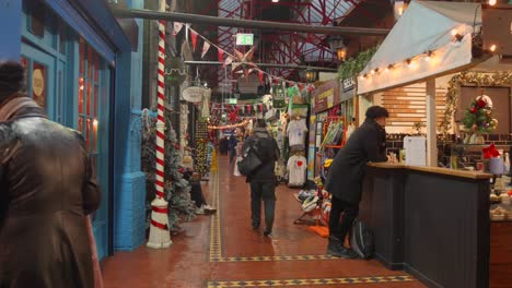 Dublin,-Ireland---Individuals-Engage-in-Christmas-Shopping-at-George-Street-Arcade---Medium-Shot