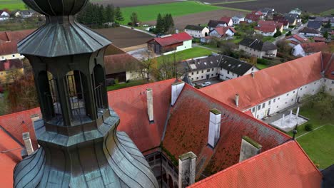Roofs-And-Courtyard-Of-Hartheim-Castle-In-Upper-Austria---Drone-Shot