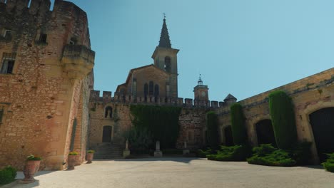 Slow-establishing-shot-of-Chateau-de-Pouzilhac-with-a-open-courtyard