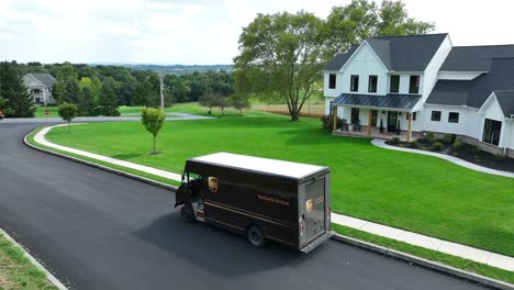 UPS-truck,-United-Parcel-Service-delivery-at-American-home